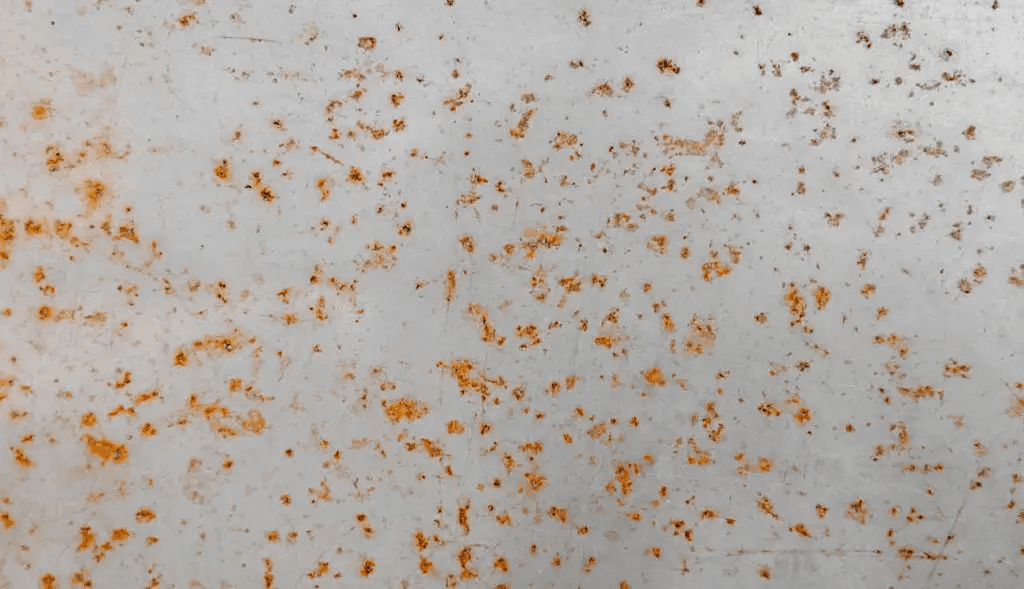 Imágen de como el acero se oxida a pesar de ser una plancha de acero inoxidable. cga.com.co